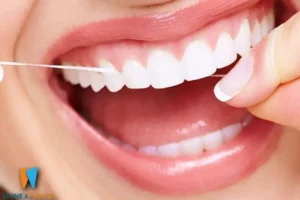 عکس نخ دندان کشیدن دندان ها